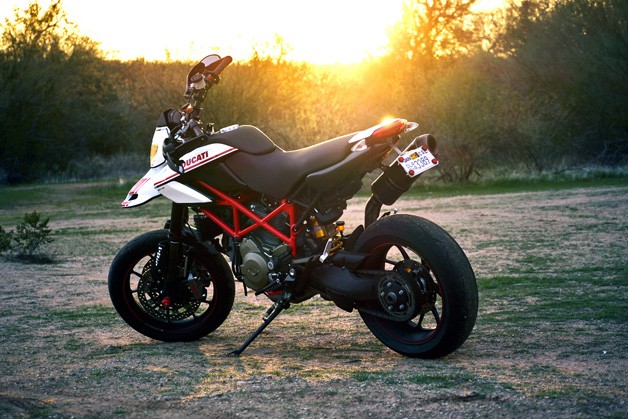Ducati Hypermotard 1100 EVO SP - rear three-quarter view at sunset